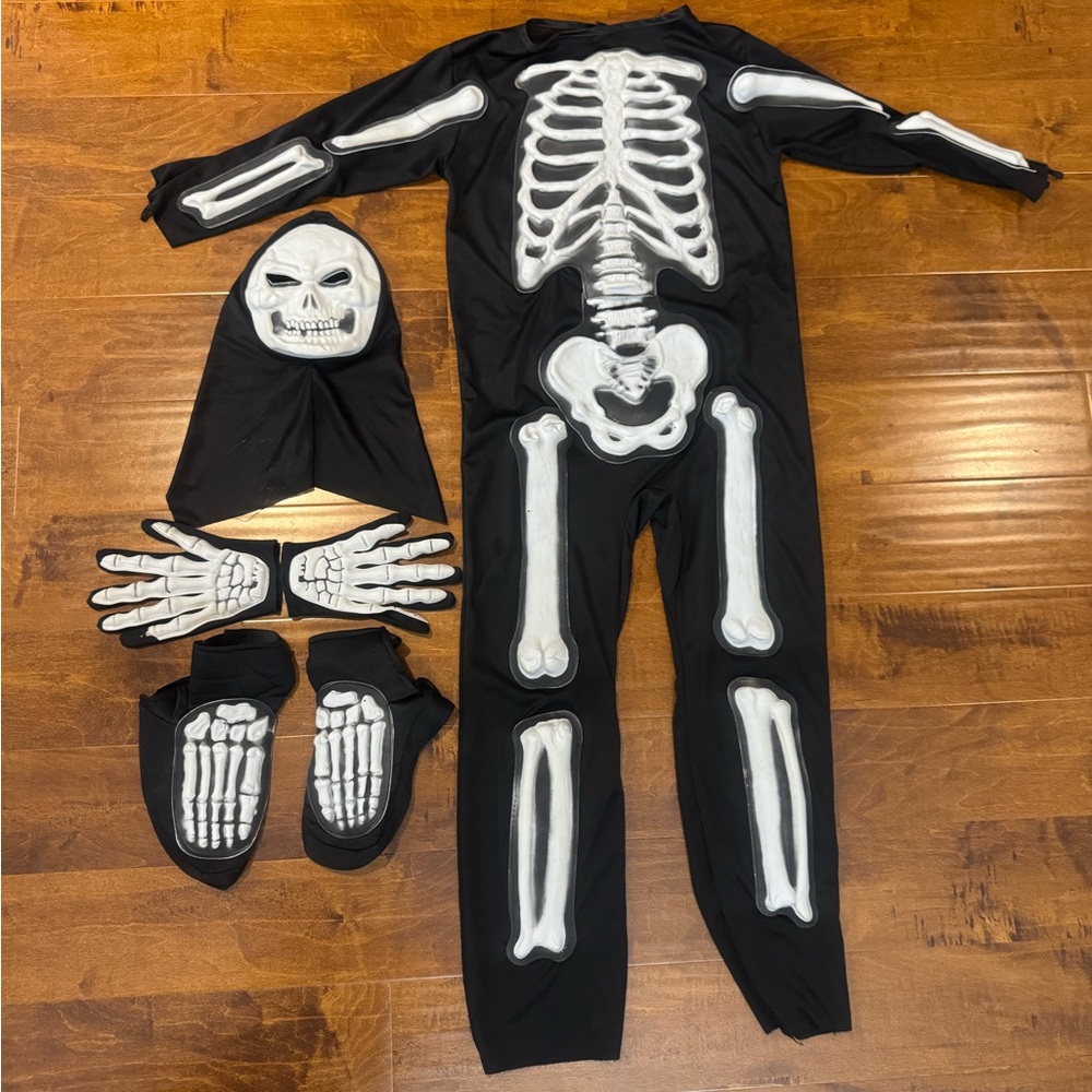 Youth black skeleton costume with white raised bones, mask, gloves & shoe covers